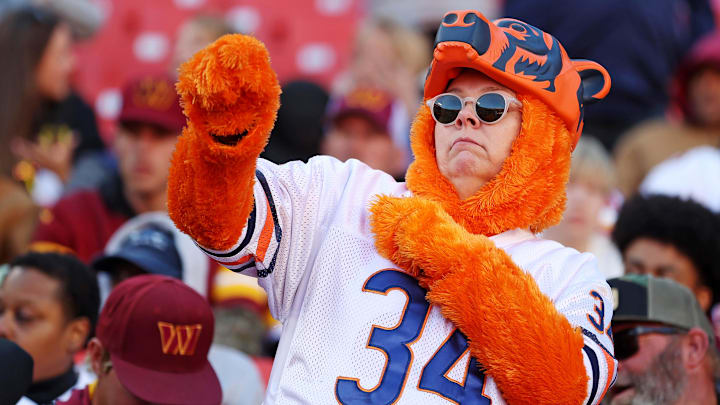 Oct 27, 2024; Landover, Maryland, USA; A Chicago Bears fans dances before the game between the Washington Commanders and the Chicago Bears at Commanders Field. Mandatory Credit: Peter Casey-Imagn Images
