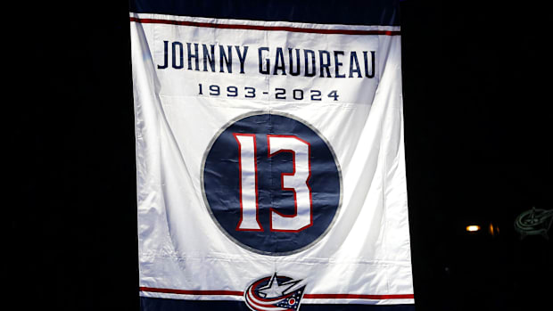 A banner in honor of late Columbus Blue Jackets forward Johnny Gaudreau