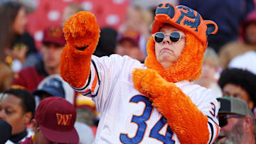 A Chicago Bears fan dances before the game between the Washington Commanders and the Chicago Bears at Commanders Field.