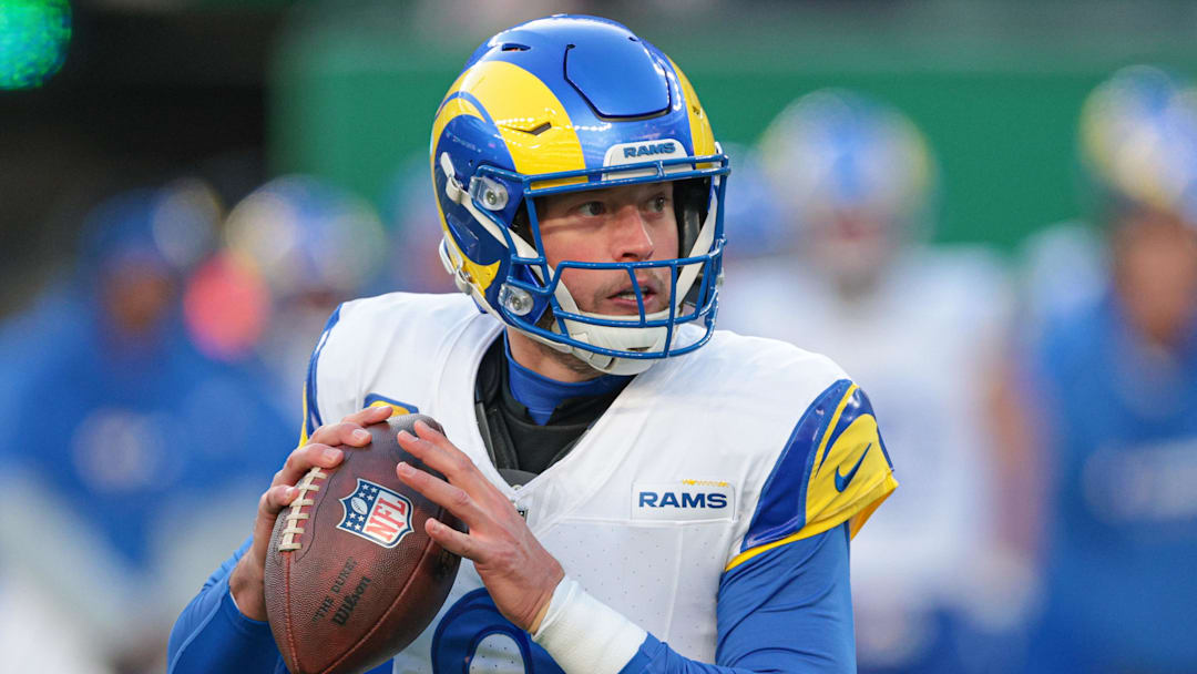 Dec 22, 2024; East Rutherford, New Jersey, USA; Los Angeles Rams quarterback Matthew Stafford (9) drops back to pass during the second half against the New York Jets at MetLife Stadium. Mandatory Credit: Vincent Carchietta-Imagn Images