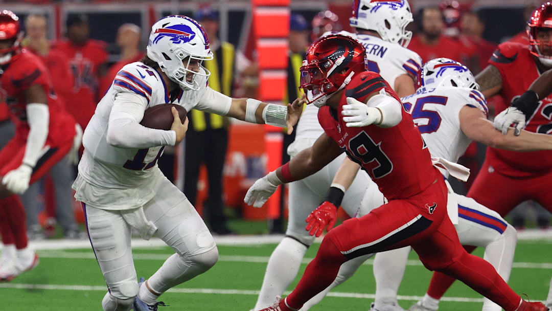 Nov 20, 2025; Houston, Texas, USA; Houston Texans linebacker Henry To'oTo'o (39) sacks Buffalo Bills quarterback Josh Allen (17)