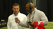 Jan 10, 2015; Arlington, TX, USA; Ohio State Buckeyes head coach Urban Meyer answers questions from Eddie George (right) during Media day at Dallas Convention Center.