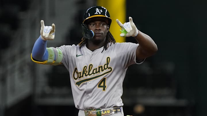 Aug 31, 2024; Arlington, Texas, USA; Oakland Athletics right fielder Lawrence Butler (4) reacts at second base after hitting a double during the sixth inning against the Texas Rangers at Globe Life Field.