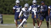 May 14, 2022; Frisco, Texas, USA; Dallas Cowboys wide receiver Jalen Tolbert (18) goes through drills during practice at the Ford Center at the Star Training Facility in Frisco, Texas.   Mandatory Credit: Tim Heitman-USA TODAY Sports