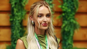 American influencer Morgan Riddle poses before the Miami Grand Prix at Miami International Autodrome.