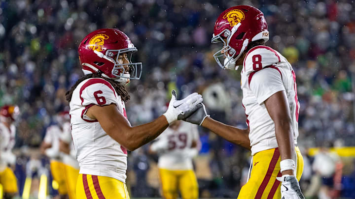 Receivers Makai Lemon (left) and Ja'Kobi Lane (right) will be a crucial part of USC’s game plan against Oregon this weekend. 