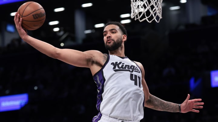 Apr 7, 2024; Brooklyn, New York, USA; Sacramento Kings forward Trey Lyles (41) rebounds during the second half against the Brooklyn Nets at Barclays Center. Mandatory Credit: Vincent Carchietta-USA TODAY Sports