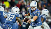 Nov 13, 2025; Foxborough, Massachusetts, USA; New England Patriots quarterback Drake Maye (10) hands off the ball to running back Treveyon Henderson (32) against the New York Jets in the third quarter at Gillette Stadium. Mandatory Credit: David Butler II-Imagn Images