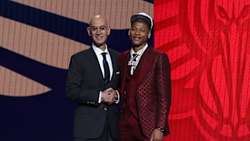 Jeremiah Fears, Adam Silver at the2025 NBA Draft - Round One