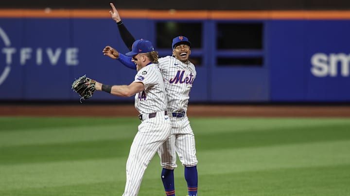 Sep 3, 2024; New York City, New York, USA;  New York Mets center fielder Harrison Bader (44) and shortstop Francisco Lindor (12) celebrate after defeating the Boston Red Sox at Citi Field.