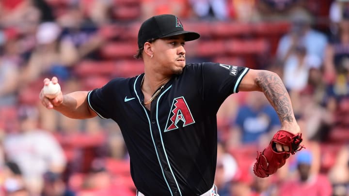 Aug 25, 2024; Boston, Massachusetts, USA; Arizona Diamondbacks pitcher Justin Martinez (63) pitches against the Boston Red Sox during the ninth inning at Fenway Park. Mandatory Credit: Eric Canha-USA TODAY Sports