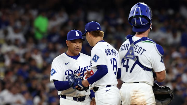 Sep 18, 2025; Los Angeles, California, USA;  Los Angeles Dodgers manager Dave Roberts (30) takes out starting pitcher Yoshinobu Yamamoto (18) from the game during the sixth inning against the San Francisco Giants at Dodger Stadium. Mandatory Credit: Kiyoshi Mio-Imagn Images