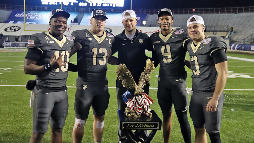 Dec 28, 2024; Shreveport, LA, USA; The Army Black Knights celebrate a 27-6 win against the Louisiana Tech Bulldogs to capture the 2024 Radiance Technologies Independence Bowl at Independence Stadium. 