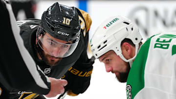 Jan 28, 2025; Las Vegas, Nevada, USA; Vegas Golden Knights center Nicolas Roy (10) looks to take a face off against Dallas Stars left wing Jamie Benn (14) during the second period at T-Mobile Arena. Mandatory Credit: Stephen R. Sylvanie-Imagn Images