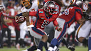 Feb 8, 2020; Houston, TX, USA; Houston Roughnecks quarterback P.J. Walker (11) runs the ball against the Los Angeles Wildcats during the third quarter in a XFL football game at TDECU Stadium. Mandatory Credit: Troy Taormina-Imagn Images
