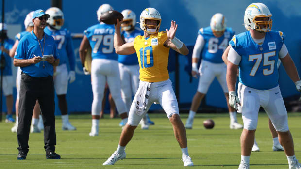 Los Angeles Chargers quarterback Justin Herbert (10) throws during the first day of training camp practice.