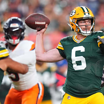 Packers QB Sean Clifford gets ready to throw the ball against Denver in the preseason.