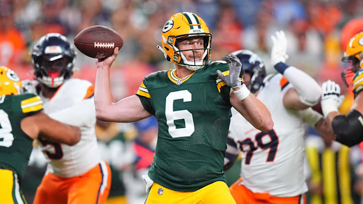 Packers QB Sean Clifford gets ready to throw the ball against Denver in the preseason.