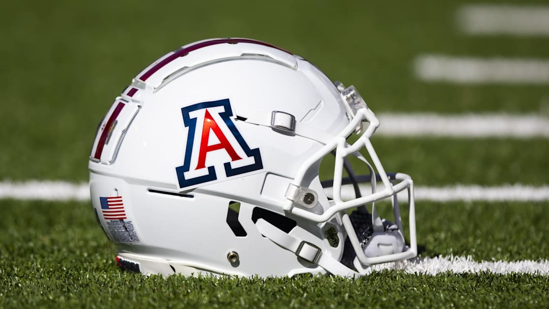 Nov 25, 2022; Tucson, Arizona, USA; Detailed view of an Arizona Wildcats helmet on the field during the Territorial Cup at Arizona Stadium. Mandatory Credit: Mark J. Rebilas-Imagn Images