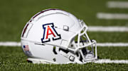 Nov 25, 2022; Tucson, Arizona, USA; Detailed view of an Arizona Wildcats helmet on the field during the Territorial Cup at Arizona Stadium. Mandatory Credit: Mark J. Rebilas-Imagn Images