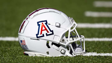 Nov 25, 2022; Tucson, Arizona, USA; Detailed view of an Arizona Wildcats helmet on the field during the Territorial Cup at Arizona Stadium. Mandatory Credit: Mark J. Rebilas-Imagn Images