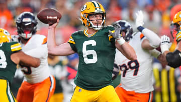 Aug 18, 2024; Denver, Colorado, USA; Green Bay Packers quarterback Sean Clifford (6) prepares to pass the ball in the first quarter against the Denver Broncos at Empower Field at Mile High. Mandatory Credit: Ron Chenoy-USA TODAY Sports