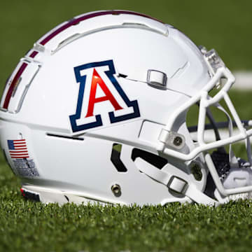 Nov 25, 2022; Tucson, Arizona, USA; Detailed view of an Arizona Wildcats helmet on the field during the Territorial Cup at Arizona Stadium. Mandatory Credit: Mark J. Rebilas-Imagn Images