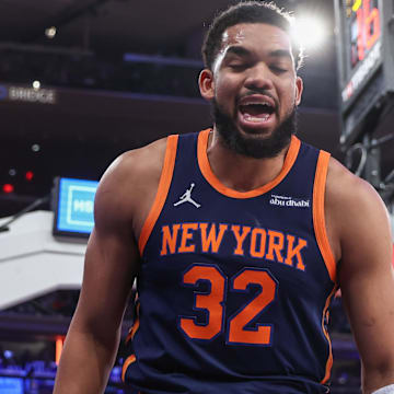 New York Knicks center Karl-Anthony Towns (32) reacts after getting fouled in the first quarter against the Dallas Mavericks at Madison Square Garden. Mandatory Credit: Wendell Cruz-Imagn Images