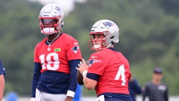 Jul 24, 2024; Foxborough, MA, USA;  New England Patriots quarterback Bailey Zappe (4) throws a pass during training camp at Gillette Stadium.