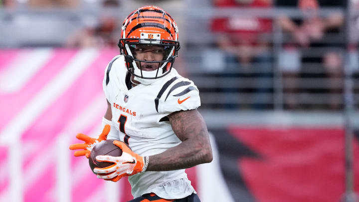 Oct 8, 2023; Glendale, Arizona, USA; Cincinnati Bengals wide receiver Ja'Marr Chase (1) scores a touchdown against the Arizona Cardinals during the second half at State Farm Stadium. Mandatory Credit: Joe Camporeale-USA TODAY Sports