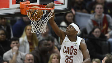 Nov 13, 2025; Cleveland, Ohio, USA; Cleveland Cavaliers forward Nae'Qwan Tomlin (35) dunks in the fourth quarter against the Toronto Raptors at Rocket Arena. Mandatory Credit: David Richard-Imagn Images