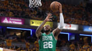 May 25, 2024; Indianapolis, Indiana, USA; Boston Celtics forward Xavier Tillman (26) shoots the ball against the Indiana Pacers during the third quarter of game three of the eastern conference finals in the 2024 NBA playoffs at Gainbridge Fieldhouse. Mandatory Credit: Trevor Ruszkowski-USA TODAY Sports