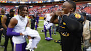 Nov 6, 2022; Landover, Maryland, USA; Minnesota Vikings wide receiver Justin Jefferson (L) exchanges jerseys with Washington Commanders wide receiver Terry McLaurin (17) after their game at FedExField.