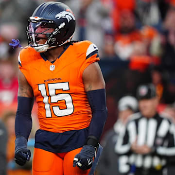 Nov 17, 2024; Denver, Colorado, USA; Denver Broncos linebacker Nik Bonitto (15) celebrates his sack in the second half against the Atlanta Falcons at Empower Field at Mile High. Mandatory Credit: Ron Chenoy-Imagn Images