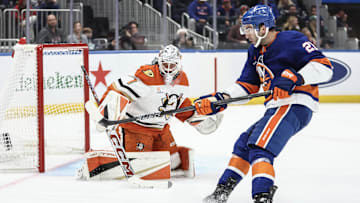 Oct 29, 2024; Elmont, New York, USA;  Anaheim Ducks goaltender Lukas Dostal (1) defends against a shot on goal attempt by New York Islanders center Kyle Palmieri (21) in the second period at UBS Arena. Mandatory Credit: Wendell Cruz-Imagn Images