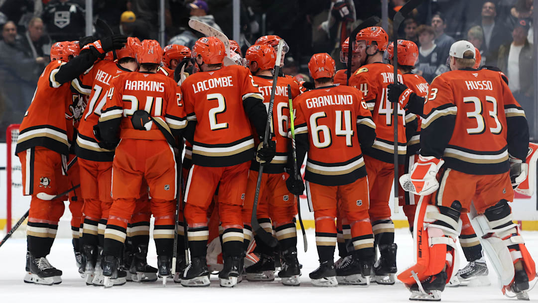 Jan 16, 2026; Los Angeles, California, USA;  Anaheim Ducks players celebrate a win after defeating the Los Angeles Kings 3-2 at Crypto.com Arena. Mandatory Credit: Kiyoshi Mio-Imagn Images