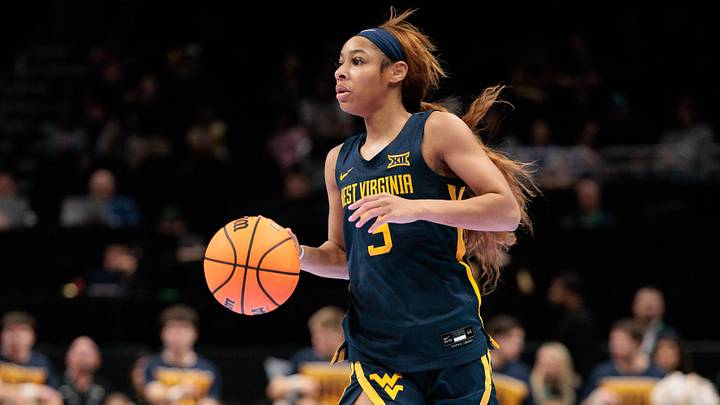 Mar 8, 2026; Kansas City, MO, USA; West Virginia Mountaineers guard Gia Cooke (3) brings the ball up court during the first half against the TCU Horned Frogs at T-Mobile Center. Mandatory Credit: William Purnell-Imagn Images