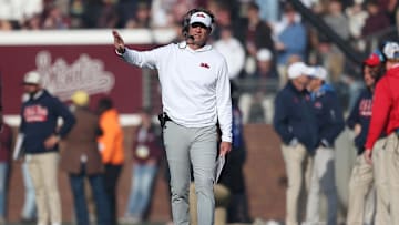 Nov 28, 2025; Starkville, Mississippi, USA; Mississippi Rebels head coach Lane Kiffin looks on in the second half against the Mississippi State Bulldogs at Davis Wade Stadium at Scott Field. Mandatory Credit: Petre Thomas-Imagn Images