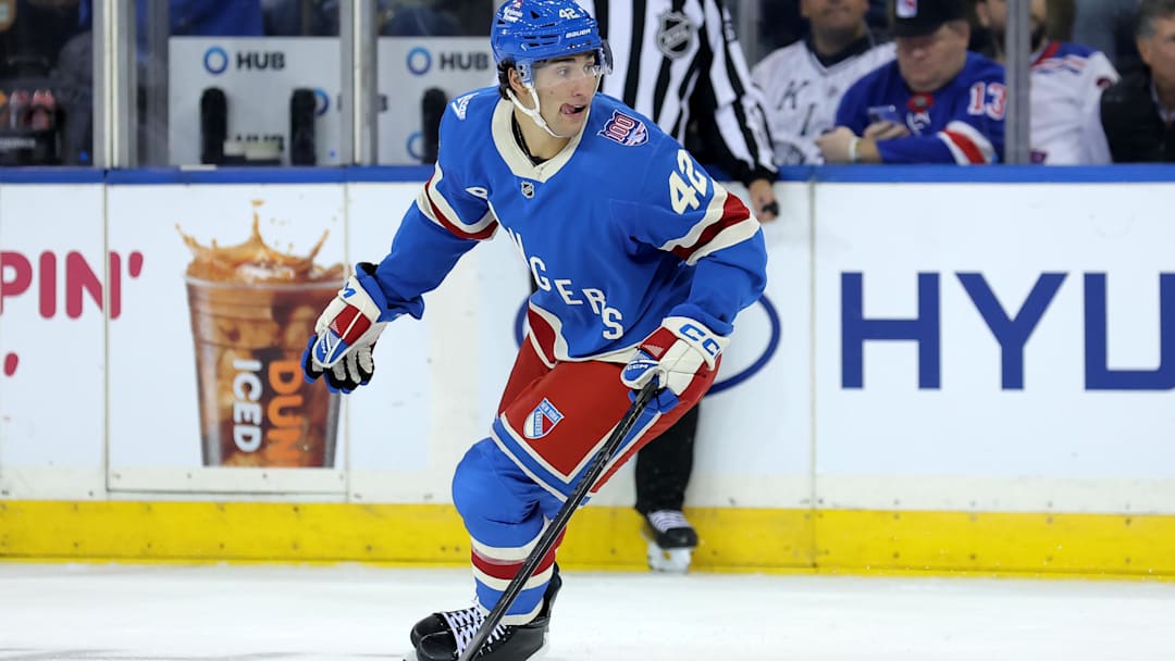 Oct 7, 2025; New York, New York, USA; New York Rangers center Noah Laba (42) skates against the Pittsburgh Penguins during the first period at Madison Square Garden. Mandatory Credit: Brad Penner-Imagn Images