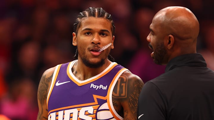 Phoenix Suns guard Jalen Green with assistant coach Chaisson Allen against the Cleveland Cavaliers at Mortgage Matchup Center.