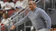 Jan 14, 2023; Louisville, Kentucky, USA;  North Carolina Tar Heels head coach Hubert Davis calls out instructions during the first half against the Louisville Cardinals at KFC Yum! Center. Mandatory Credit: Jamie Rhodes-Imagn Images