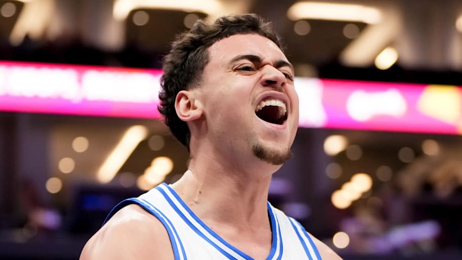 Darren Harris celebrates after a play with Duke.