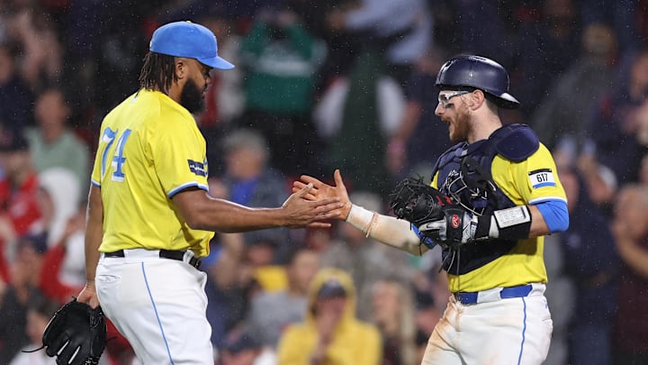 Sep 7, 2024; Boston, Massachusetts, USA; Boston Red Sox relief pitcher Kenley Jansen (74) and Boston Red Sox catcher Danny Jansen (28) celebrate after defeating the Chicago White Sox at Fenway Park. Mandatory Credit: Paul Rutherford-Imagn Images