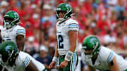 Sep 20, 2025; Oxford, Mississippi, USA; Tulane Green Wave quarterback Jake Retzlaff (12) looks on during the second quarter against the Mississippi Rebels at Vaught-Hemingway Stadium. Mandatory Credit: Petre Thomas-Imagn Images