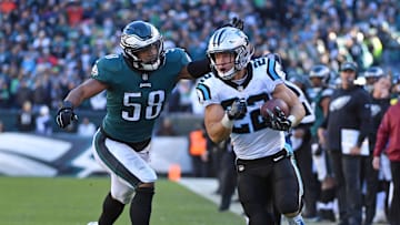 Oct 21, 2018; Philadelphia, PA, USA; Carolina Panthers running back Christian McCaffrey (22) is chased down the sidelines by Philadelphia Eagles linebacker Jordan Hicks (58) during the fourth quarter at Lincoln Financial Field. Mandatory Credit: Eric Hartline-Imagn Images