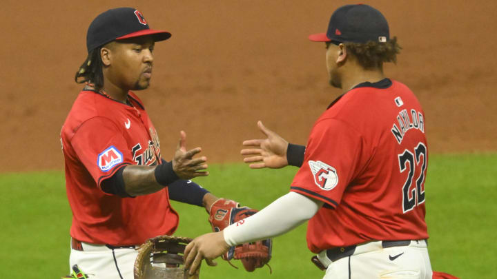 Jul 23, 2024; Cleveland, Ohio, USA; Cleveland Guardians third baseman Jose Ramirez (11) and first baseman Josh Naylor (22) celebrate a win over the Detroit Tigers at Progressive Field. Mandatory Credit: David Richard-USA TODAY Sports