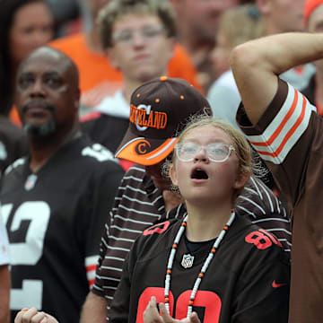 Browns fans react after a fumble was overturned by officials during the second half of an NFL football game against the Green Bay Packers at Huntington Bank Field, Sept. 21, 2025, in Cleveland, Ohio.