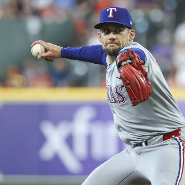 Apr 14, 2024; Houston, Texas, USA; Texas Rangers pitcher Nathan Eovaldi (17) delivers a pitch during the first inning against the Houston Astros at Minute Maid Park. 