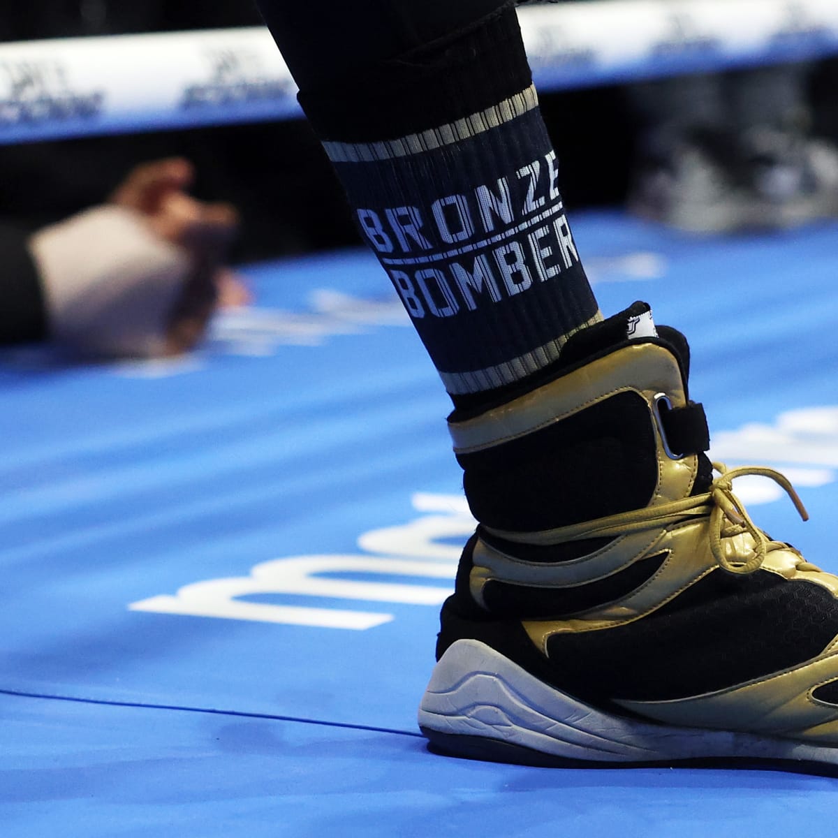 Why do boxers wear shoes MMA fighters don t