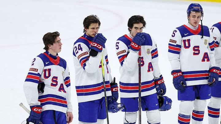 United States players react to their teams overtime loss against Finland in the quarterfinals of the 2026 IIHF World Junior Championship at Grand Casino Arena. Mandatory Credit: Matt Krohn-Imagn Images